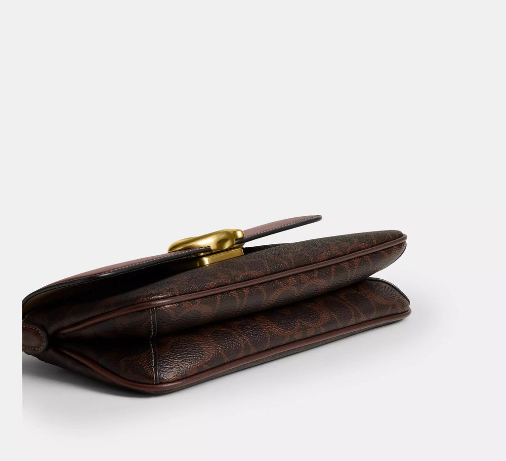 Jet Shoulder Bag In Signature Canvas