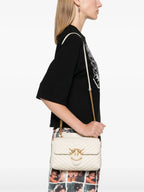 Lady Love Bag Puff medium handbag in chevron nappa leather