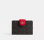 Coach Medium Corner Zip Wallet in signature canvas