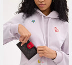 Coach Medium Corner Zip Wallet in signature canvas