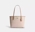 Medium City Tote Bag In Signature Canvas Sand Taupe